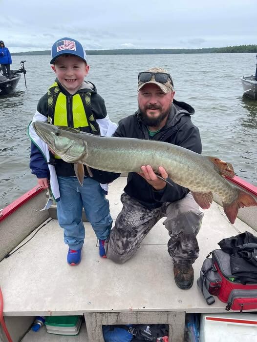 Young anglers with a muskie